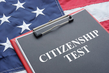 flag and clipboard that says citizenship test