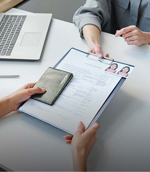 woman applying for visa in embassy