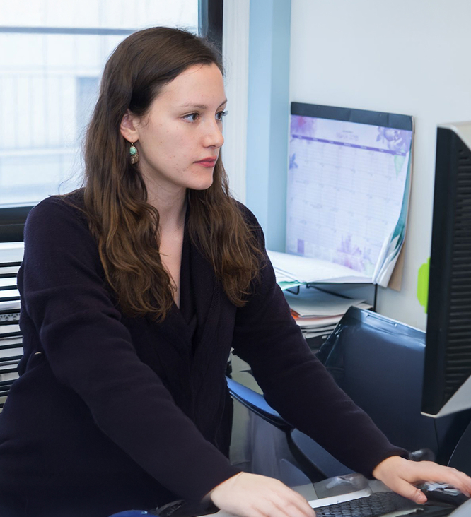 staff member using a desktop computer