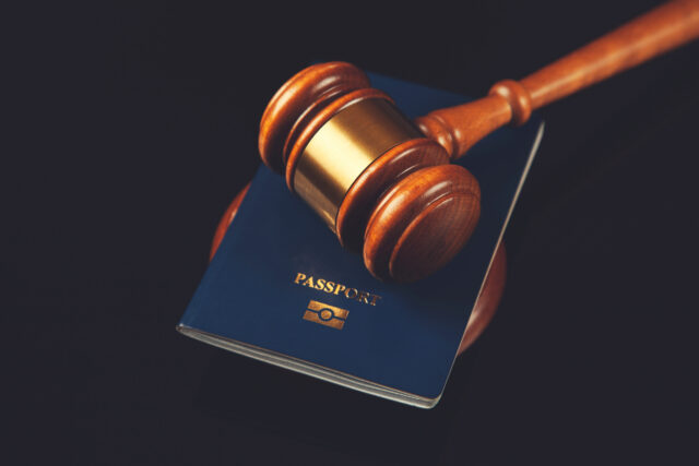 gavel with passport